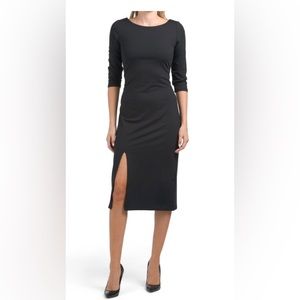 Brand New with Tags Tahari black dress. Midi length with slit. Sexy &sleek